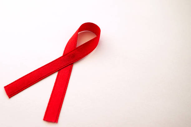 Aids Awareness Sign red ribbon with copy space for add text on white background. World Aids Day December 1 concept