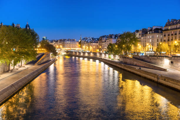 istock Paris at night - sunset over Seine river 1072188780