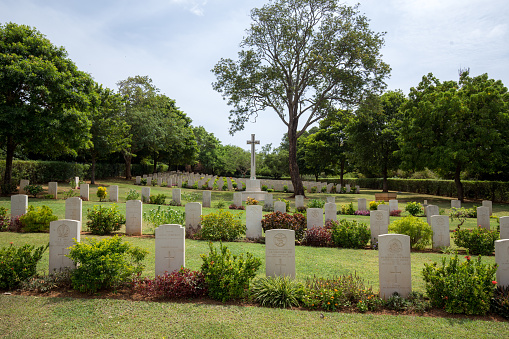 Trincomalee, Sri Lanka - August 20, 2018: Rows of gravestones on the British military cemetery for soldiers of the British Empire who were killed or died during World War II