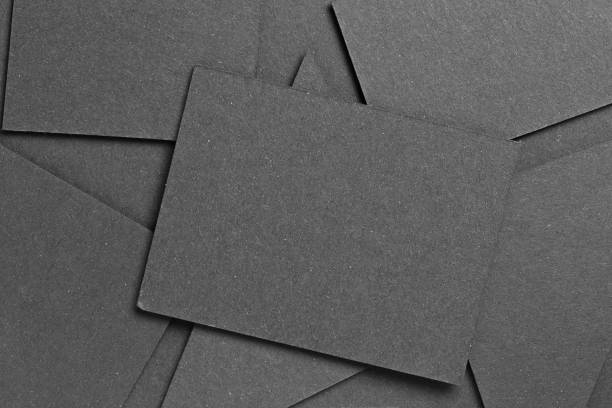 istock black textured blank cardboard on geometric graphic background. copy space 1072191860