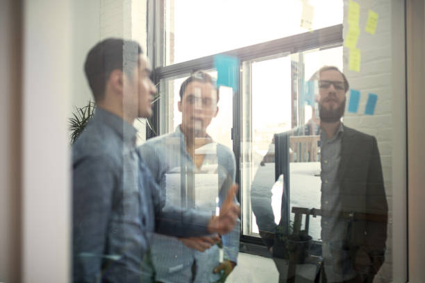 istock Trying to convince his partners he has the right solution 1072193912