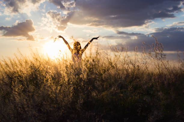 istock the girl on a sunny meadow 1072198052