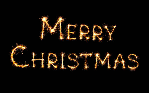 istock Merry Christmas text written sparkles fireworks 1072200534