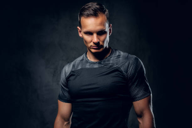istock Sporty male over grey background. 1072200804