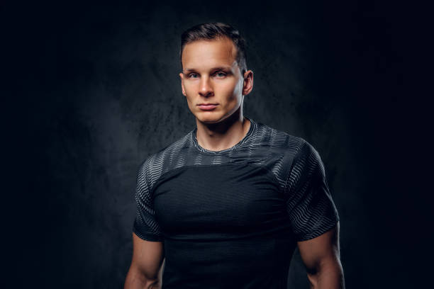 istock Sporty male over grey background. 1072200872