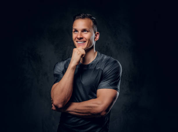 istock Sporty male over grey background. 1072201044