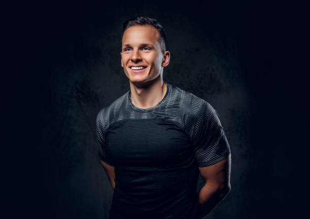 istock Sporty male over grey background. 1072201256