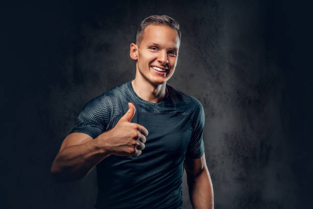 istock A man shows his big finger up. 1072201510
