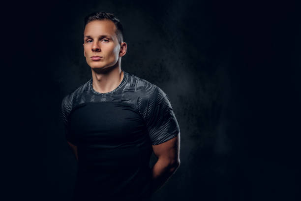 istock Sporty male over grey background. 1072203068