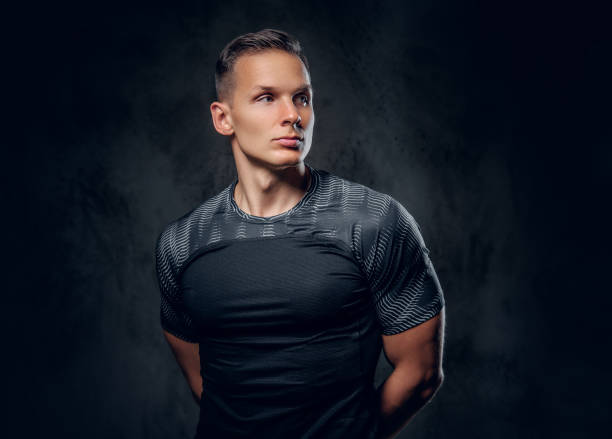 istock Sporty male over grey background. 1072203392