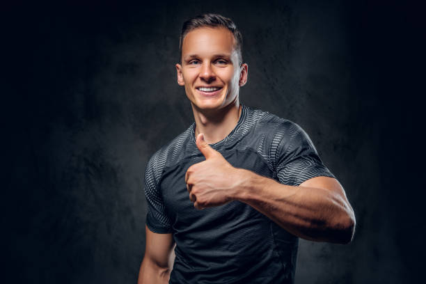 istock A man shows his big finger up. 1072203464
