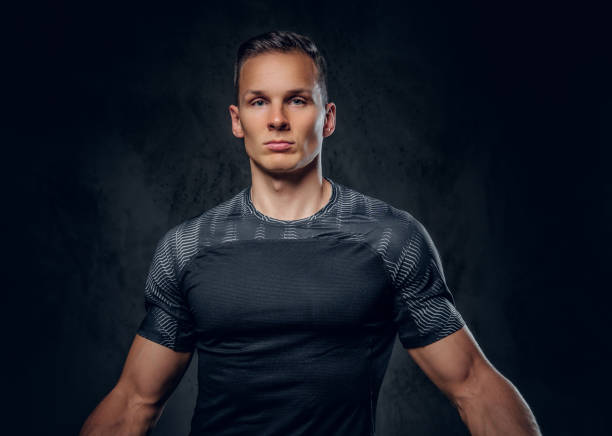 istock Sporty male over grey background. 1072203510