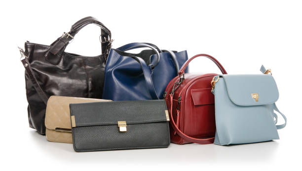 istock Woman's female bags pile many different 1072203932
