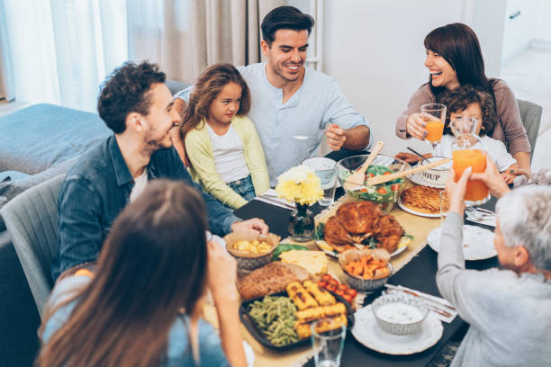 istock Family eating Christmas lunch 1072206912
