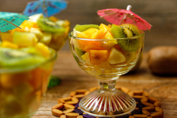 istock Cup of fresh fruit salad with different tropical fruit 1072208810