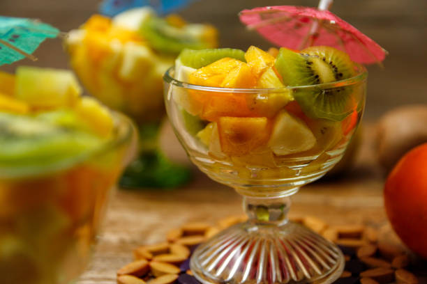 istock Cup of fresh fruit salad with different tropical fruit 1072208840