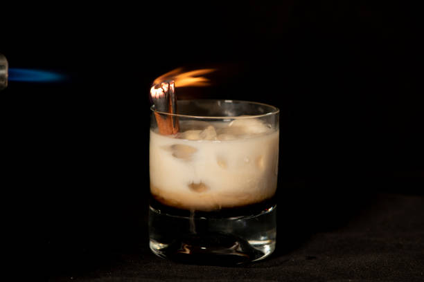 istock Flaming Cinnamon cocktail with kahlua, baileys irish cream and sambuca 1072214460