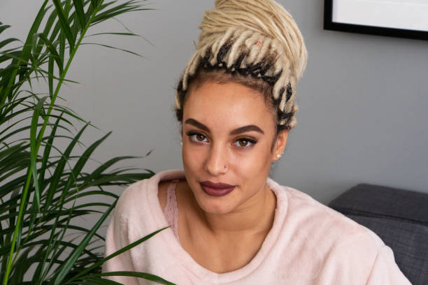 istock Happy beautiful sensual young woman with dreadlocks looking 1072220350