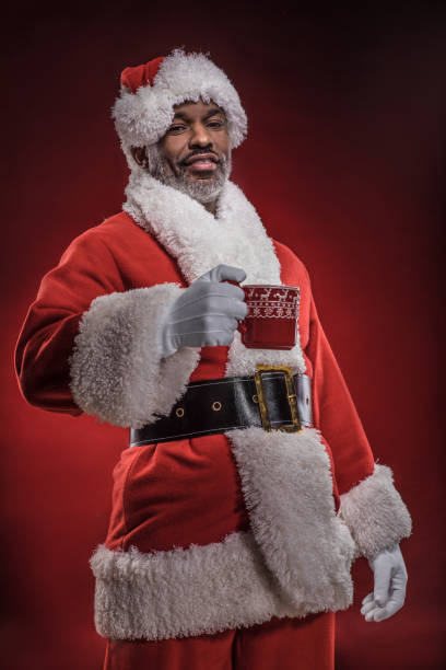Portrait of non-traditional, bearded, happy Black Santa Claus