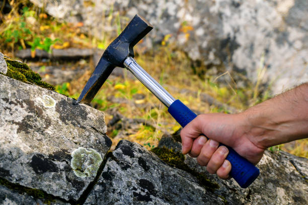 istock geological hammer in hand 1072228114