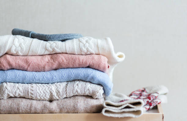 istock Pile of sweaters 1072228324