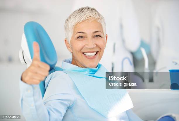 Successful Dentist Appointment Stock Photo - Download Image Now - Smiling, Dental Health, Dental Equipment