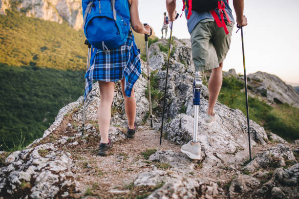 istock Motivated amputee hiking nature with his girlfriend 1072231514