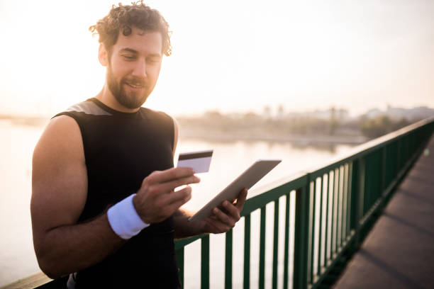 istock Athlete shopping online 1072242630