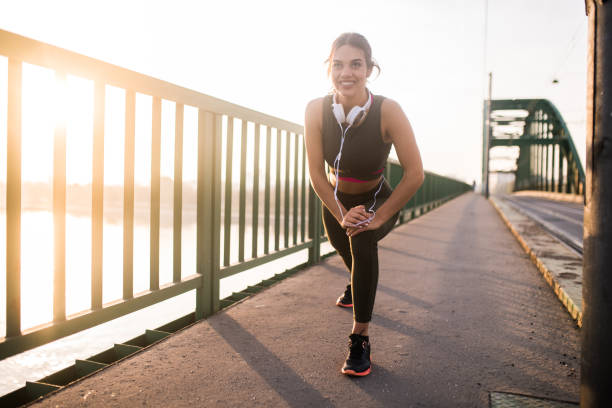 istock Smiling woman exercising 1072242948