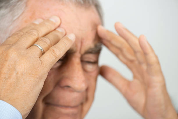 istock Senior Man Covering His Face 1072243008