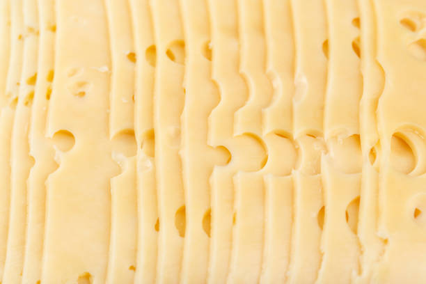 istock cheese slices in the package close-up. 1072247562