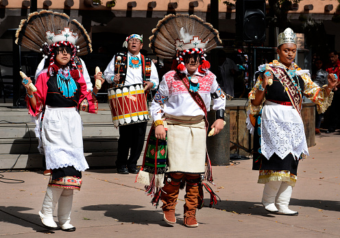 Santa Fe, New Mexico:  Members of a traditional Native-American dance group from Zuni Pueblo in New Mexico, perform in Santa Fe, New Mexico, on Indigenous Peoples Day, also known as Columbus Day.