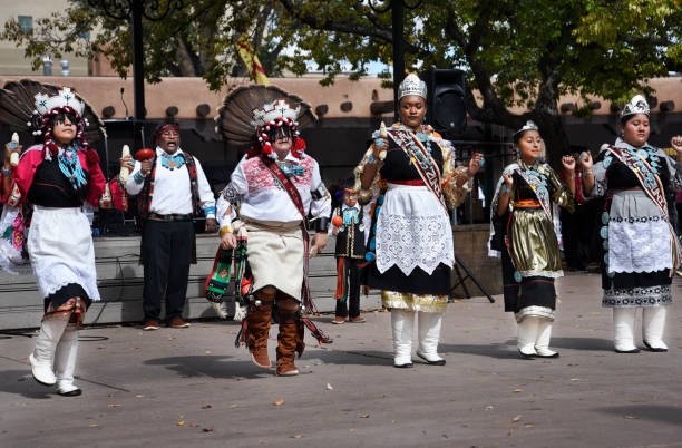 Native American dancers Santa Fe, New Mexico:  Members of a traditional Native-American dance group from Zuni Pueblo in New Mexico, perform in Santa Fe, New Mexico, on Indigenous Peoples Day, also known as Columbus Day. indigenous peoples day stock pictures, royalty-free photos & images