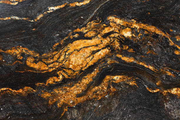 istock Patterned natural of dark brown marble texture for design. 1072250374