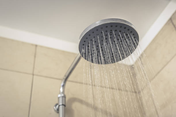 istock Water running from the shower head in the bathroom 1072255014