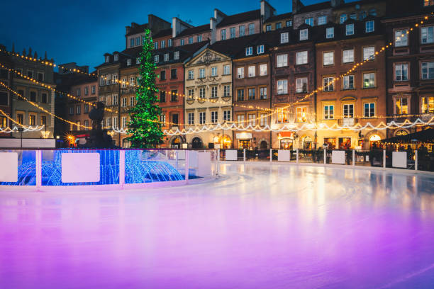 istock Ice skating near Christmas tree 1072255388