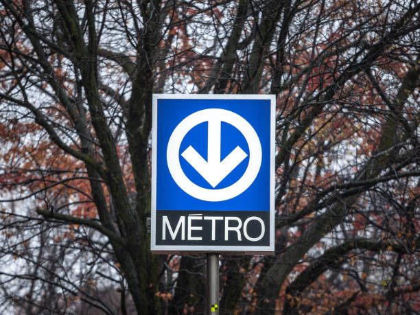 Picture of a sign with the logo of the Montreal metro, indicating a Metro station. The Montreal Metro, or Metro de Montreal, is a rubber-tired, underground rapid transit system serving the city of Montreal, Quebec, Canada. The Montreal Metro is Canada's busiest rapid transit system, and North America's third busiest by daily ridership