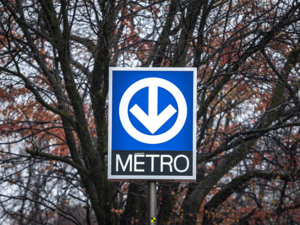 Blue Sign indicating a metro station with its distinctive logo on the Montreal metro system, managed by the STM, or Societe de transport de Montreal Picture of a sign with the logo of the Montreal metro, indicating a Metro station. The Montreal Metro, or Metro de Montreal, is a rubber-tired, underground rapid transit system serving the city of Montreal, Quebec, Canada. The Montreal Metro is Canada's busiest rapid transit system, and North America's third busiest by daily ridership stm photos stock pictures, royalty-free photos & images