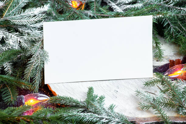 istock Blank envelope on christmas tree branches, new year decoration and garland. 1072261544