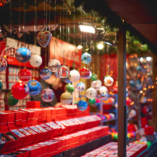 Decorative Christmas tree balls in a stall in a market.