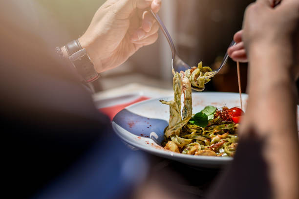 istock Man Eating Italian Pasta 1072267650