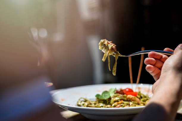 istock Man Eating Italian Pasta 1072267718