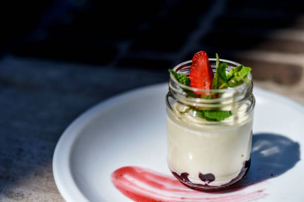 istock Homemade pudding with strawberry in jar 1072268018
