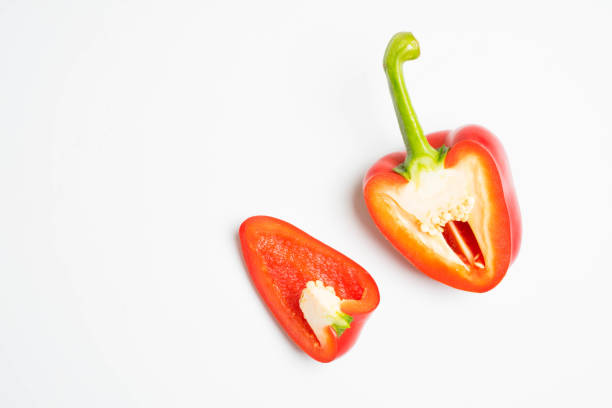 istock red bell peppers isolated on white background top view 1072278704