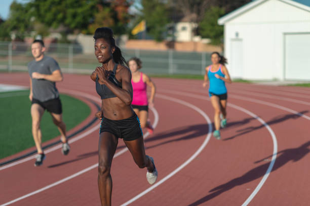 プロのマラソン ランナー - running track women running spring ストックフォトと画像