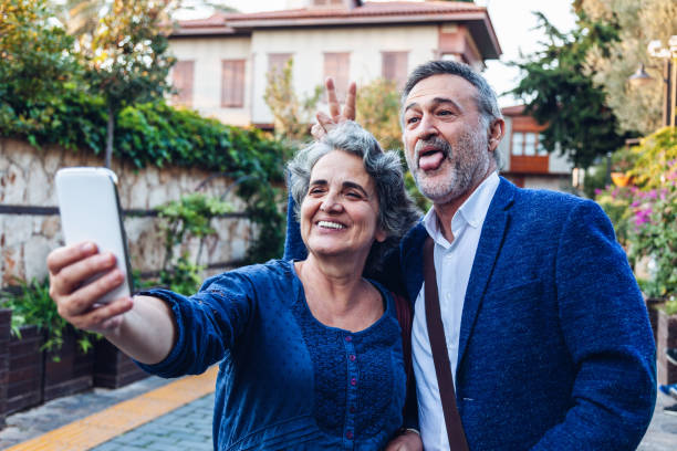 istock Tourist senior couple taking a selfie 1072283630