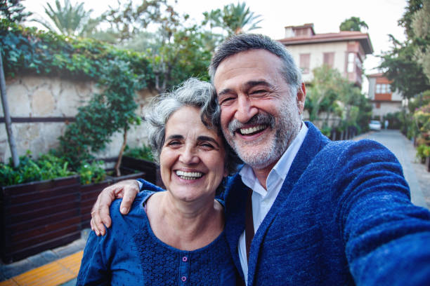 istock Tourist senior couple taking a selfie 1072283634