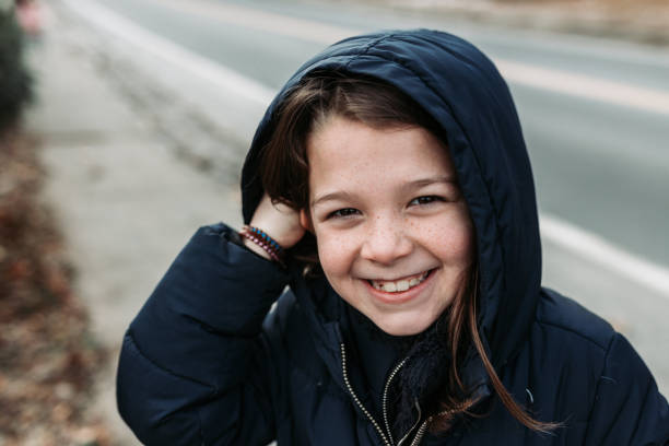 istock Child playing outside in winter 1072285178