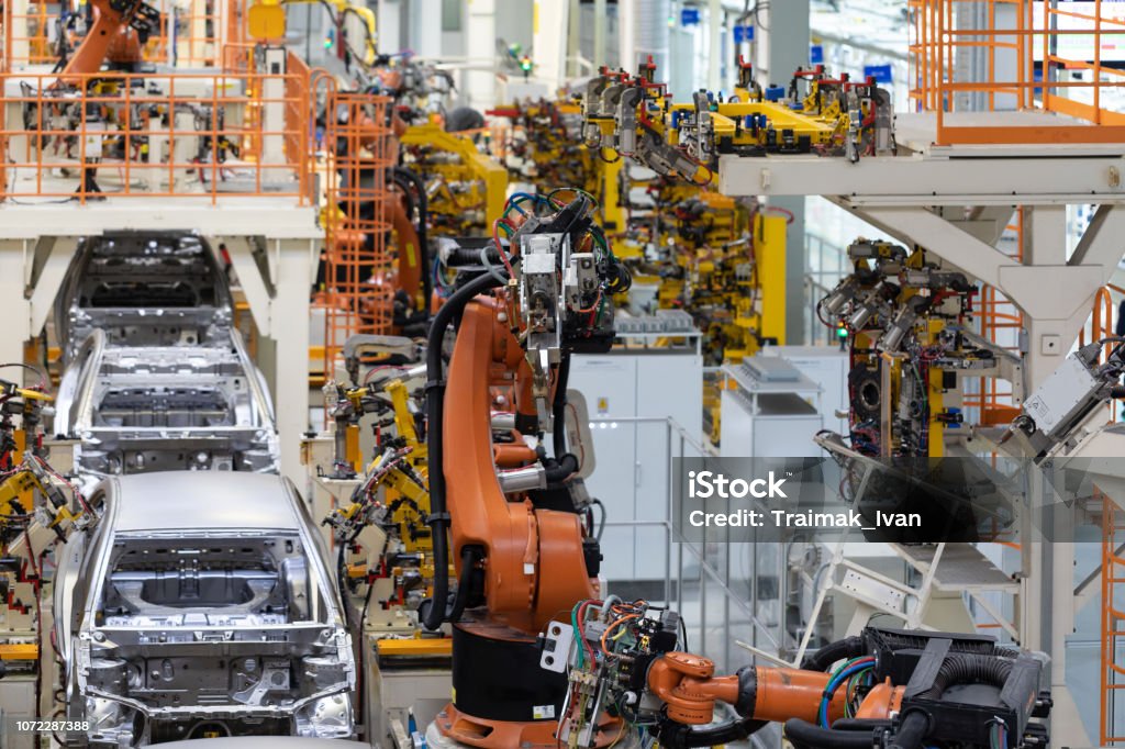 body of car on conveyor Modern Assembly of cars at plant. automated build process of car body body of car on conveyor Modern Assembly of cars at plant. automated build process of car body. Car Plant Stock Photo