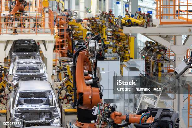 Body Of Car On Conveyor Modern Assembly Of Cars At Plant Automated Build Process Of Car Body Stock Photo - Download Image Now